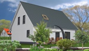Einfamilienhaus mit Satteldach und Dachflächenfenster im Garten