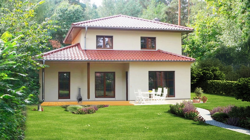 Stadtvilla Grunewald mit rotem Walmdach und Terrasse